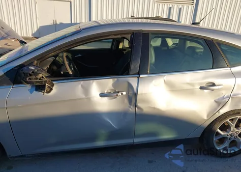 2014 Ford Focus Titanium z USA, uszkodzony, nr VIN 1FADP3N29EL276214